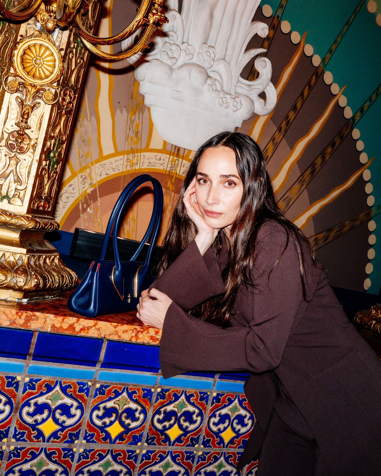 Image may contain Chiara Francini accessories, bags, handbags, faces, avatars, people, photography, portraits, wallets and adults
