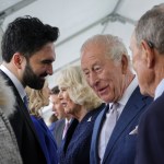 Two men talking close-up.