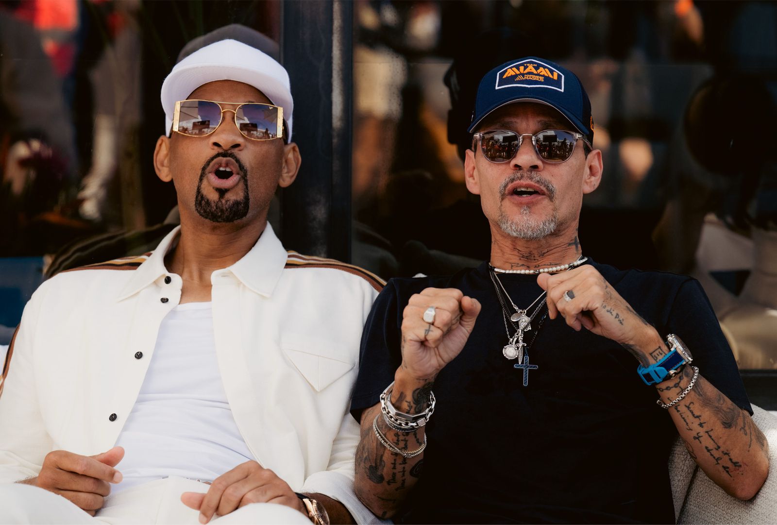 Image may contain Marc Anthony Will Smith baseball caps clothing hats accessories sunglasses people and skin
