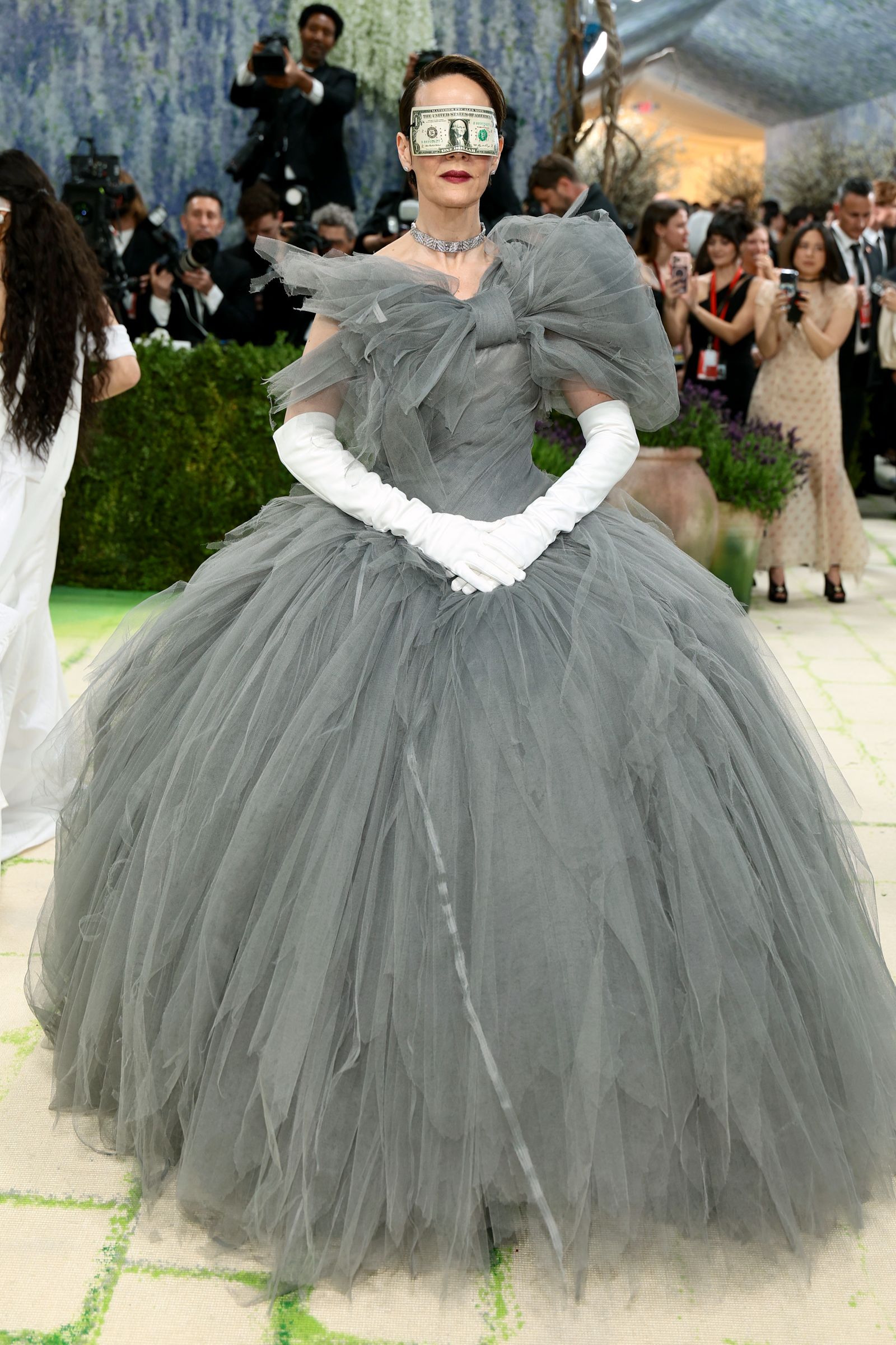 Image may contain Sarah Paulson people clothing, clothing, gloves, gowns, formal wear, adult wedding fashion and gowns