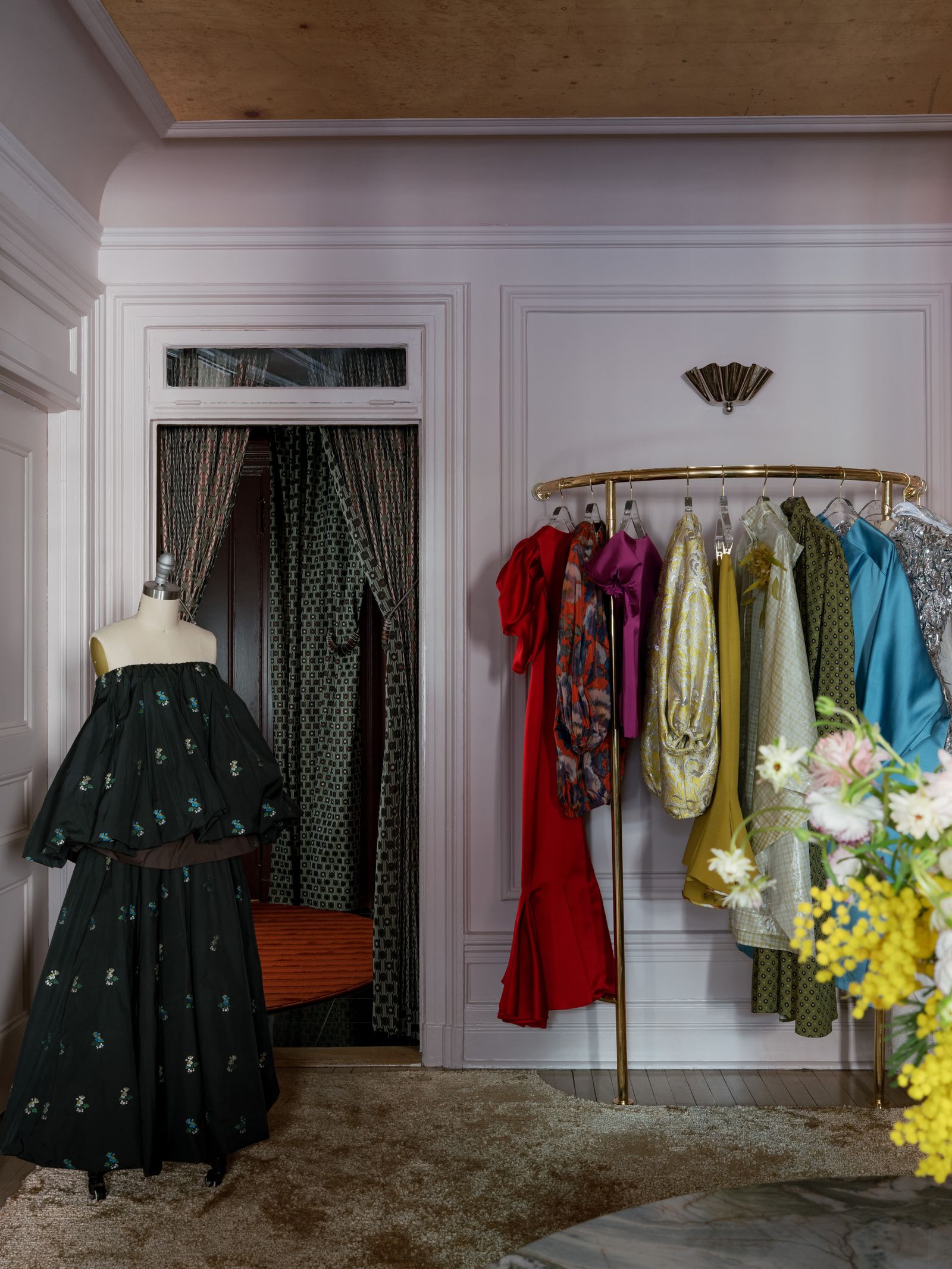 Pictures may contain dressing rooms, interior furniture, people, flower arrangements, plants and wardrobes