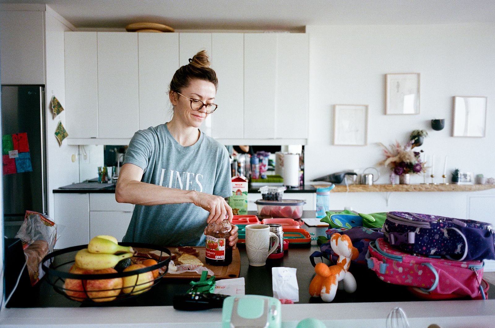Image may contain adults, blades, knives, weapons, cutting boards, food, faces and heads