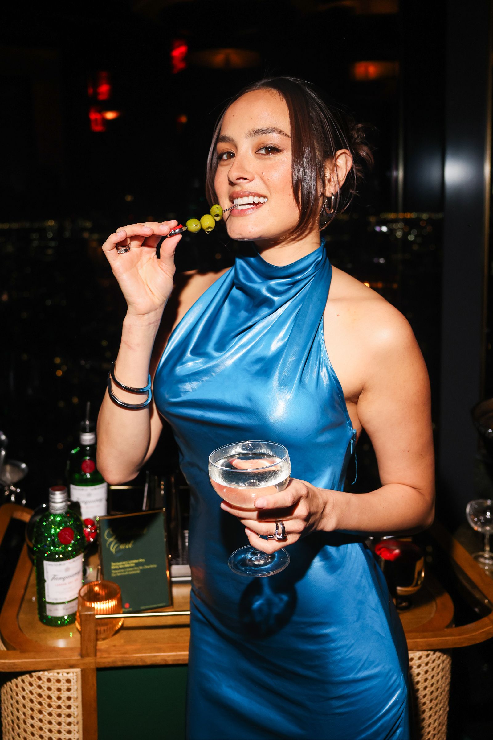 Image may contain Hayley Orrantia Urban Adult Person Face Head Photography Portrait Alcohol Beer & Beverages
