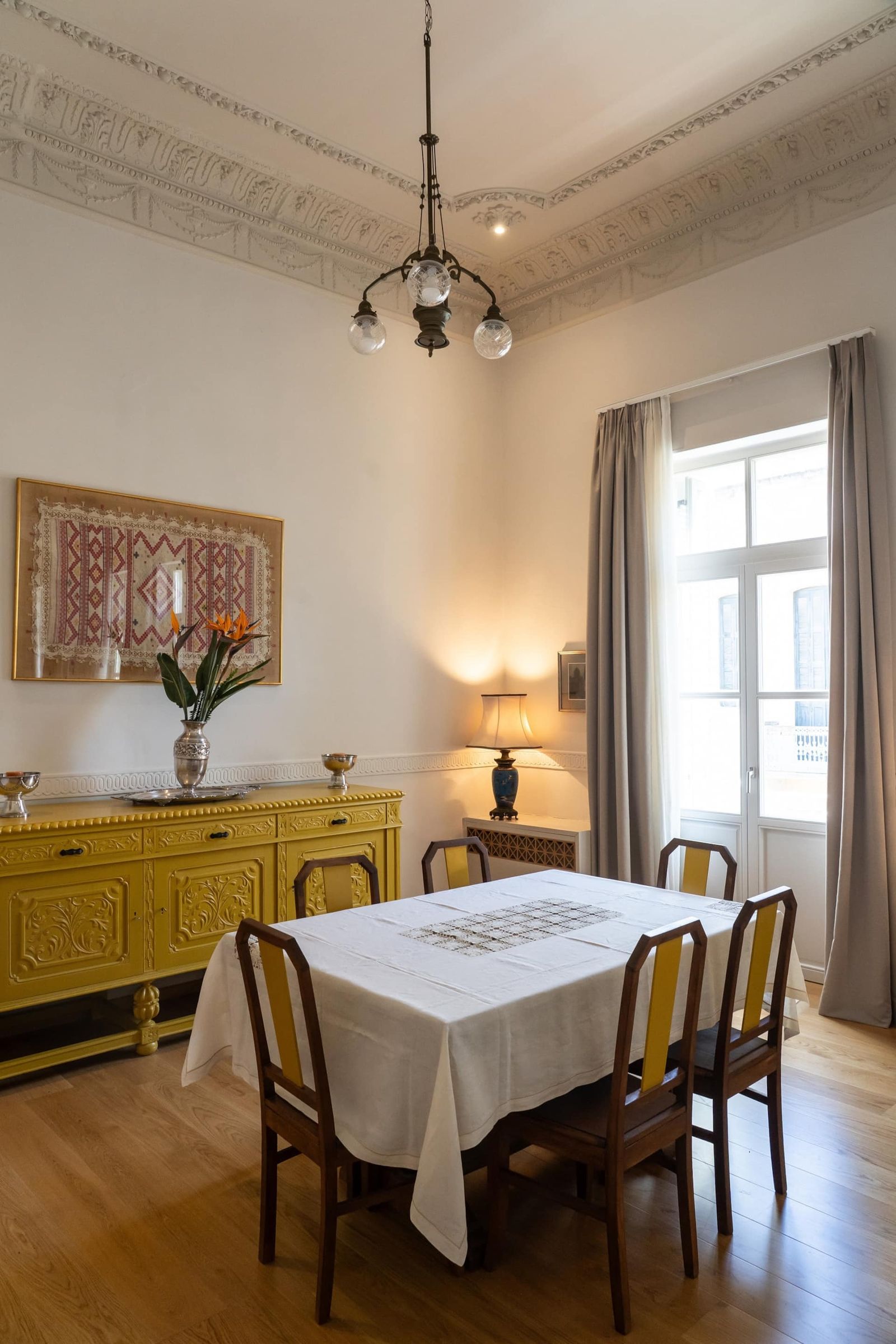 Image may contain architecture, architecture, restaurant, dining table, furniture, interior, lamp and home decor