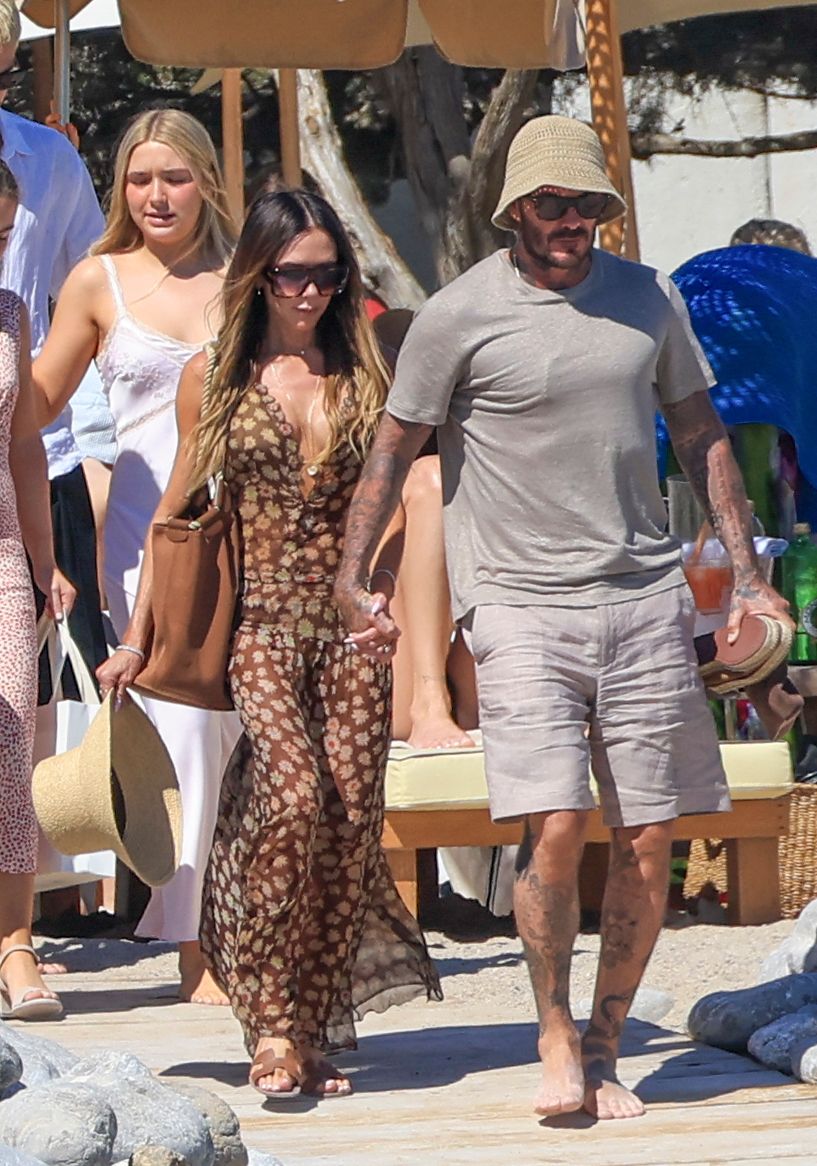 Image may contain Victoria Beckham beachwear, apparel, adult shorts, accessories, glasses, pajamas and bags