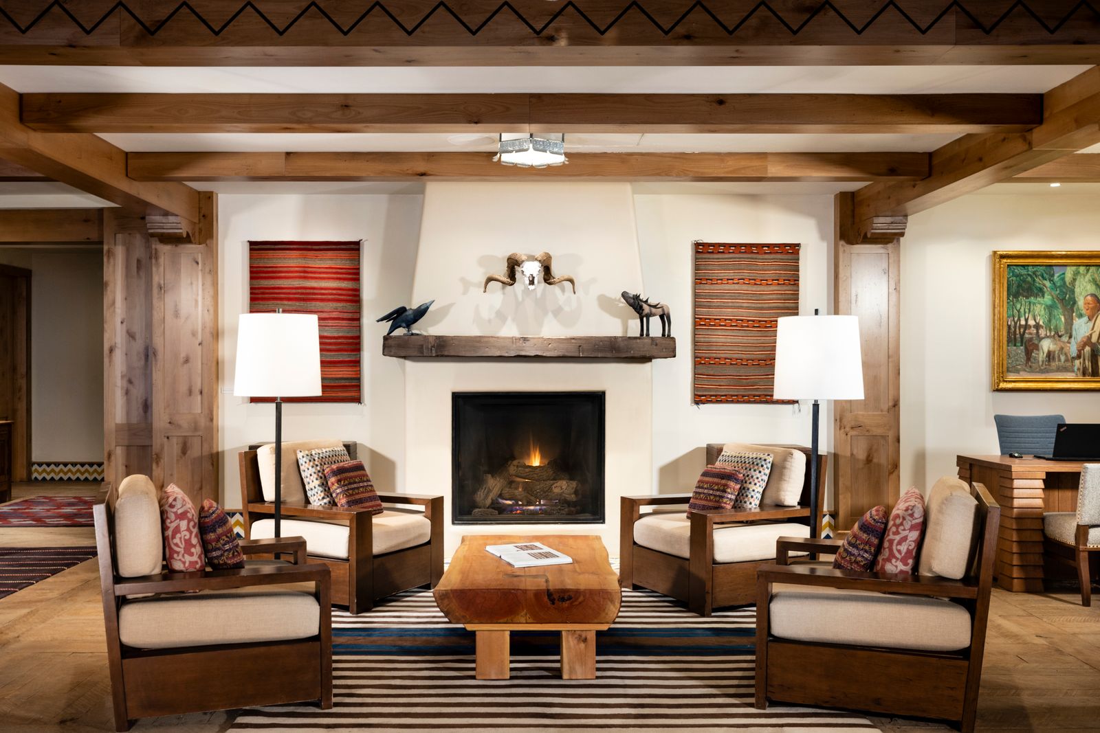 Image may contain fireplace, interior design, home decor, furniture, table, stove, coffee table, animals and birds