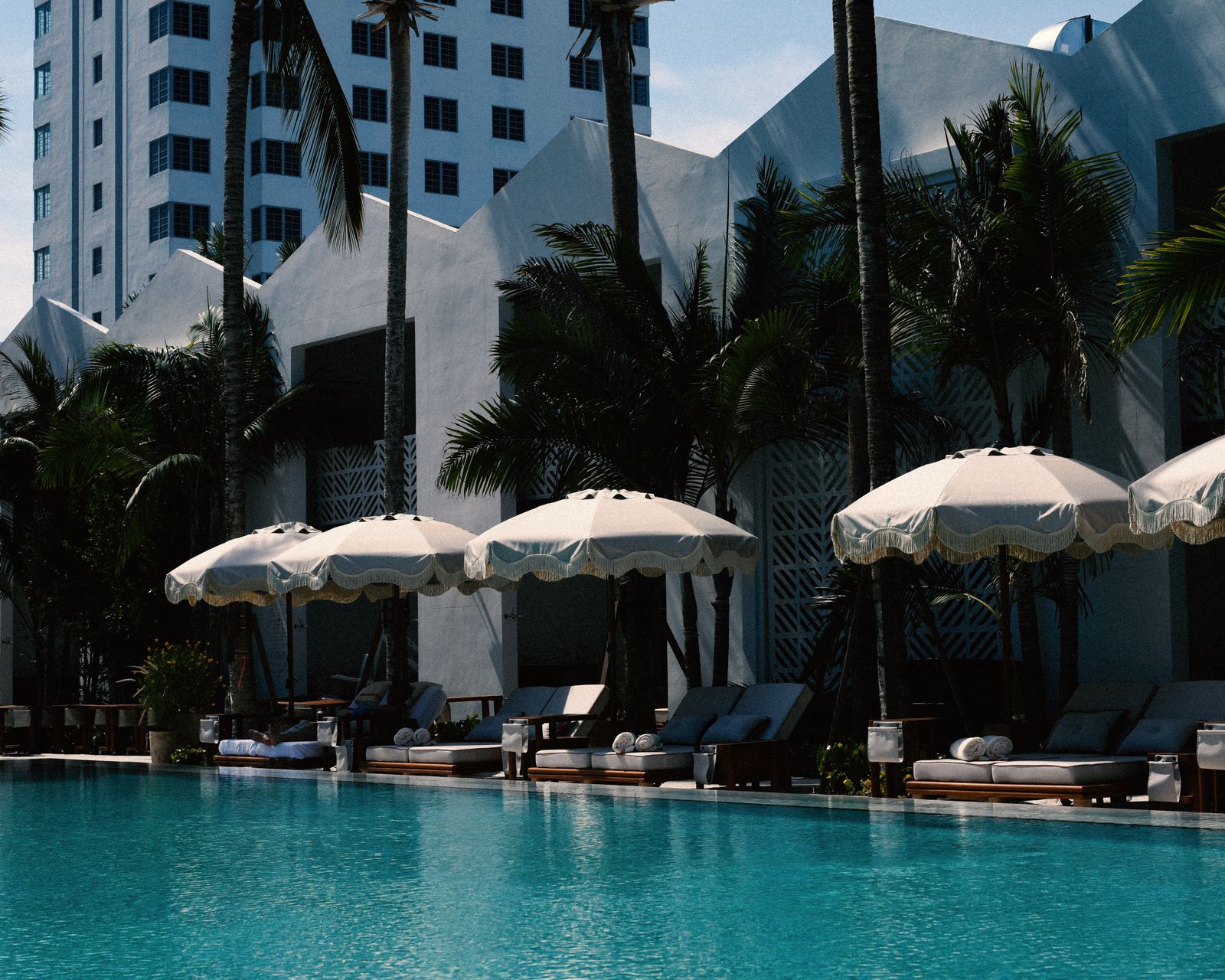 Image may contain building, building, hotel, resort, pool, water, swimming pool and summer