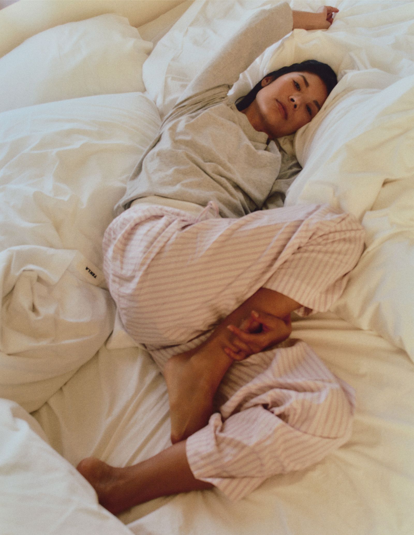 Image may contain blankets, beds, furniture, babies and people