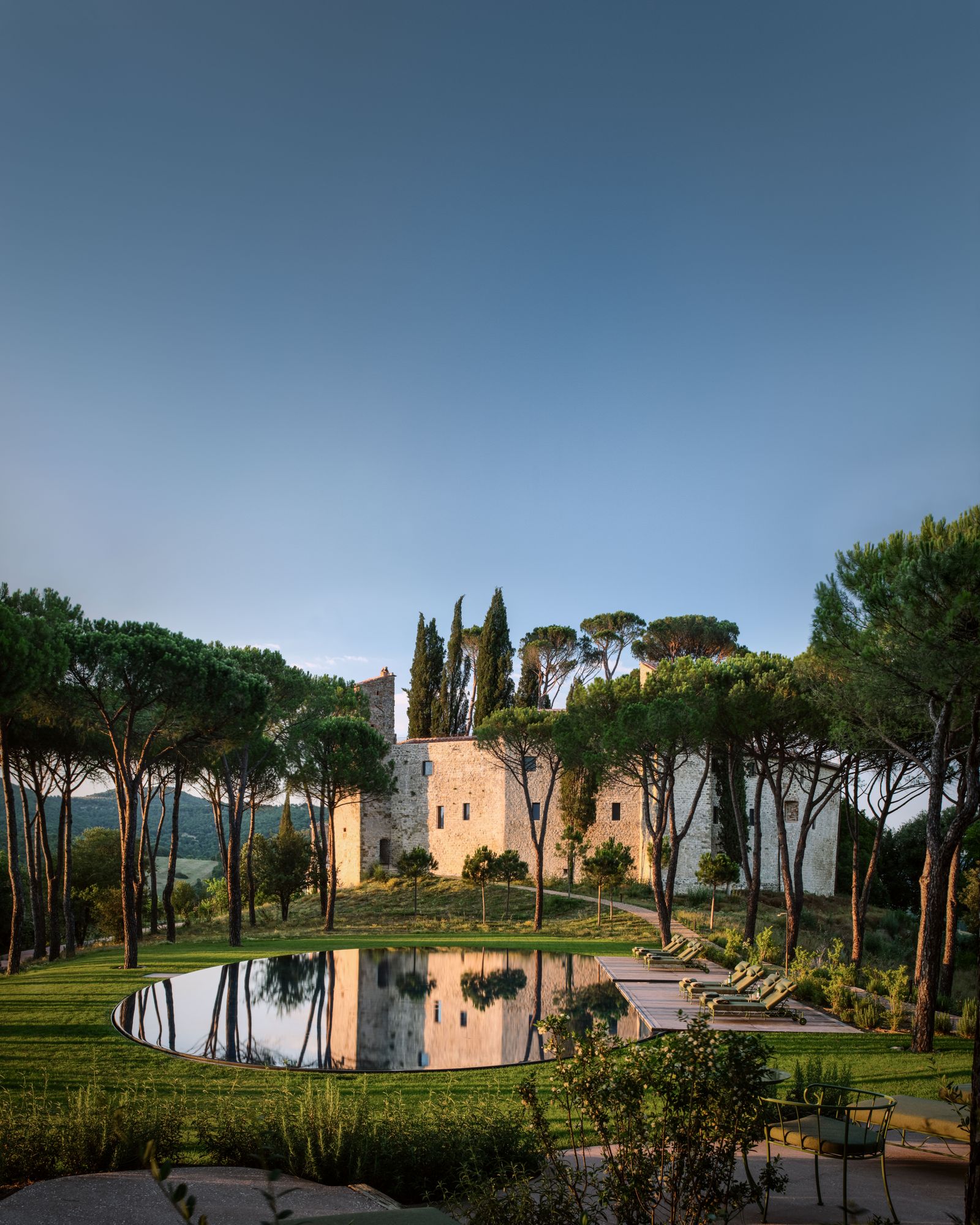 Image may contain building, architecture, house, villa, grass, plants, castle, fortress and outdoor