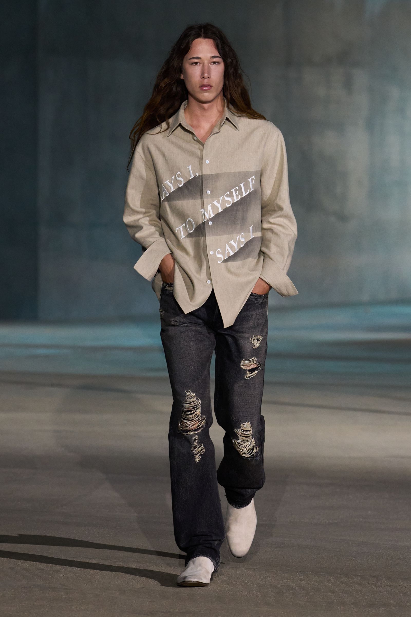 Image may contain clothing, pants, jeans, adult fashion and outerwear