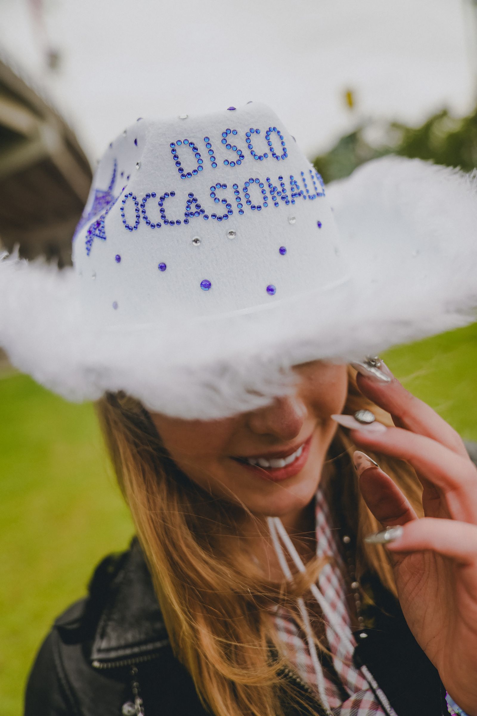Image may contain clothing, hats, faces, happy smiles, children photography, portraits and hats