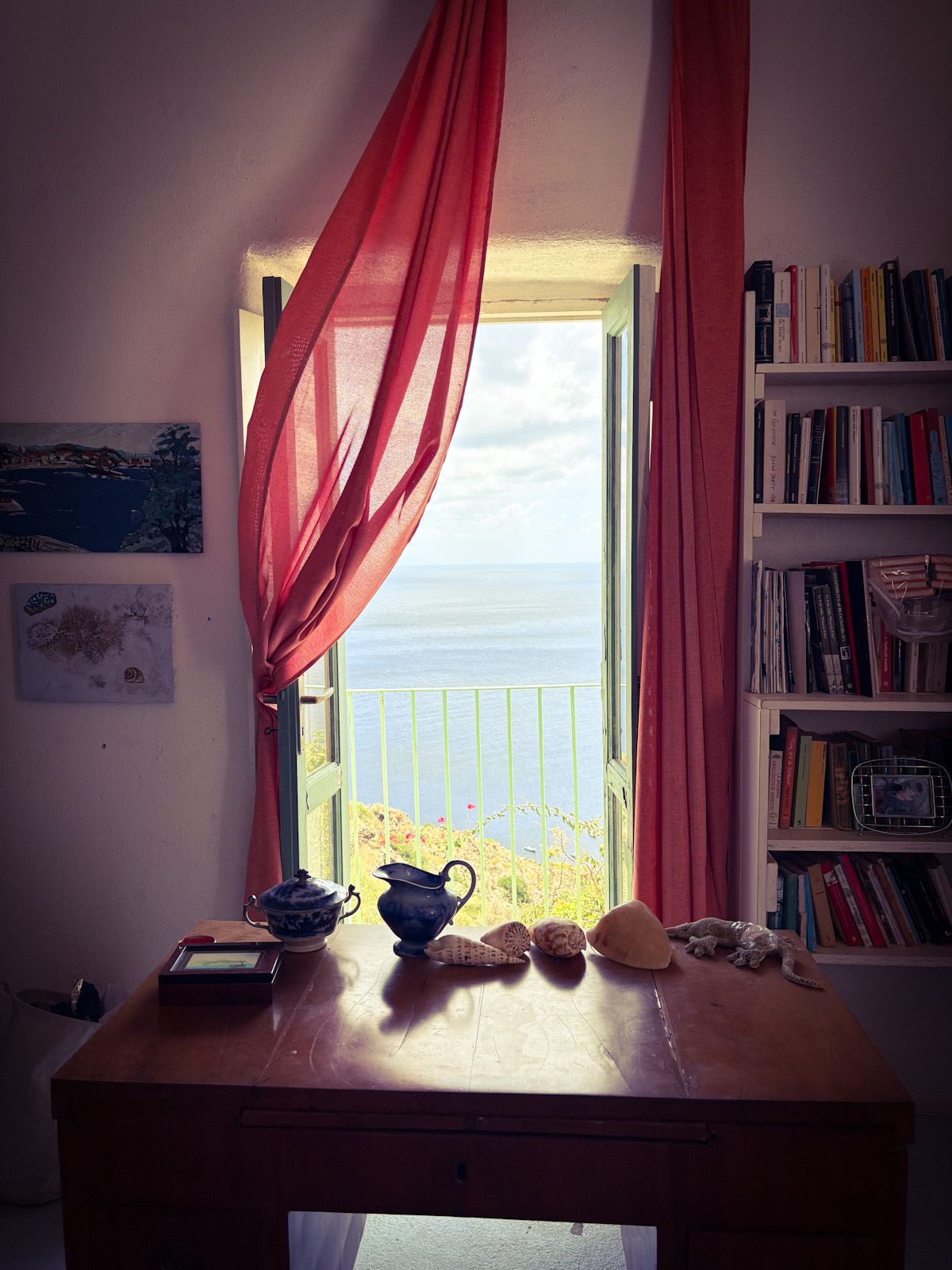 Image may contain furniture, tables, window sills and windowsills