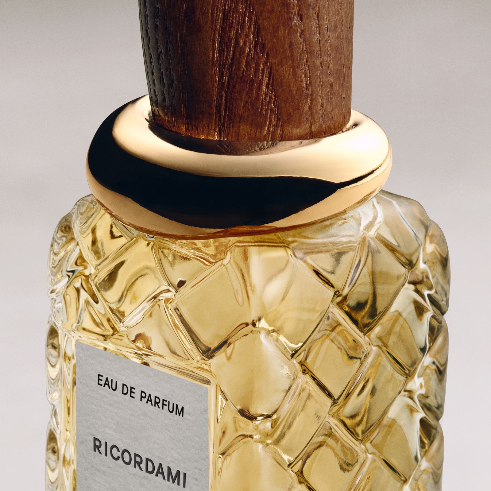 Image may contain bottles, cosmetics, perfume, adults and people