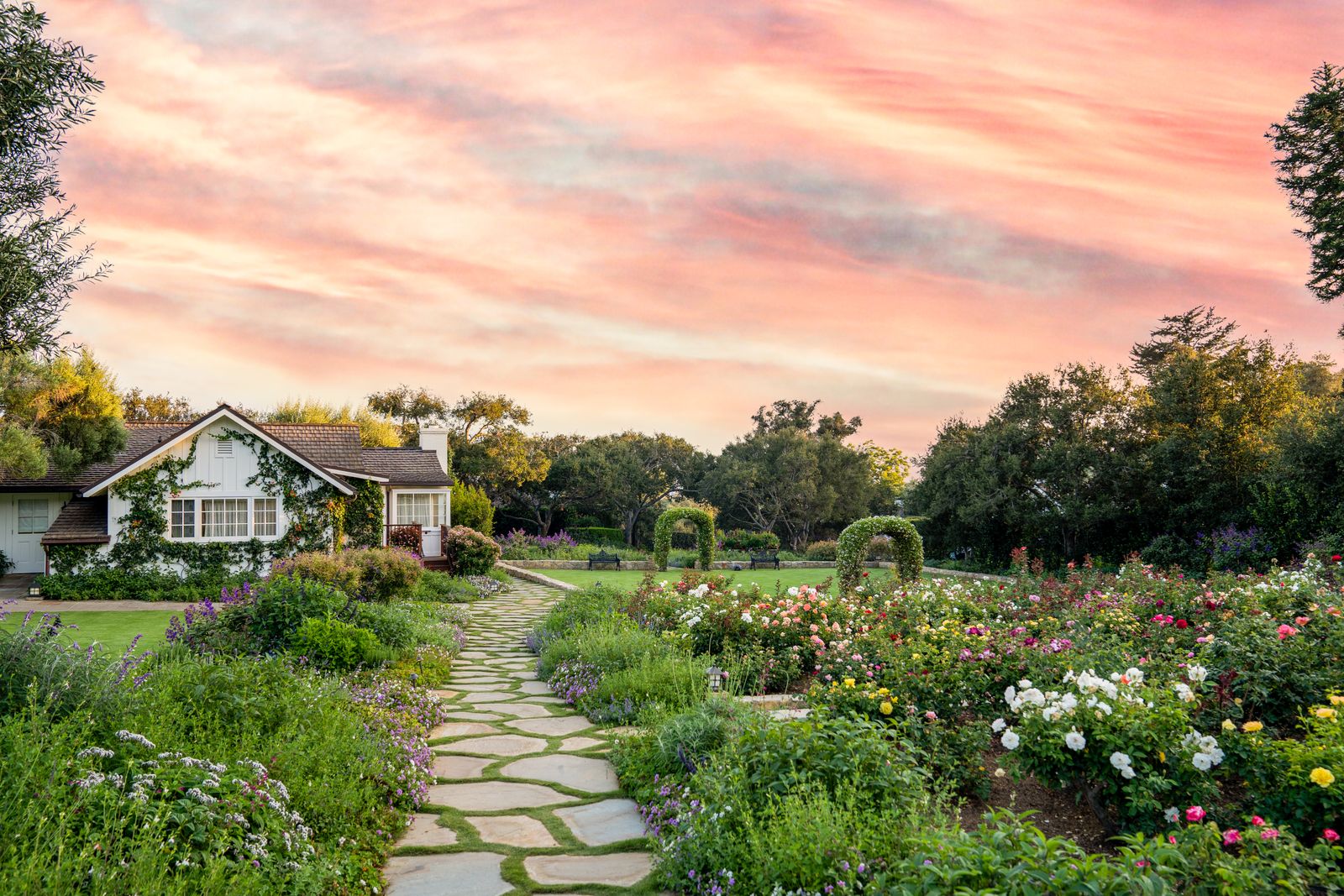 Image may contain garden, nature, outdoors, path, walkway, grass, park, botanical landscape, flagstone, backyard and patio